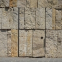 The synagogue's back door, hiding in the stone cladding