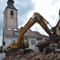 Digger on rubble