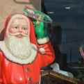 Creepy Father Christmas outside a shop