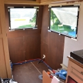 Resealed, with rotten battens and plywood replaced