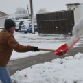 Riste clearing the driveway