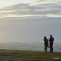 A couple enjoying the sunset at the lighthouse